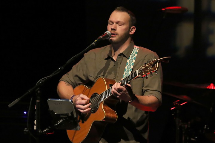 Opening act Tim Britt on guitar