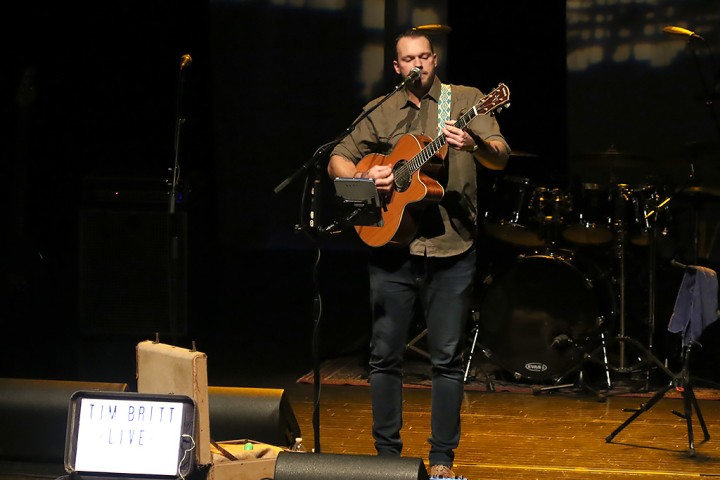 Opening act Tim Britt on guitar